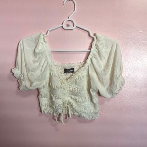 URBAN OUTFITTERS PUFF SLEEVE SMOCKED CROP TOP